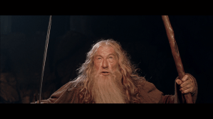 Gandalf faces Balrog with sword and staff